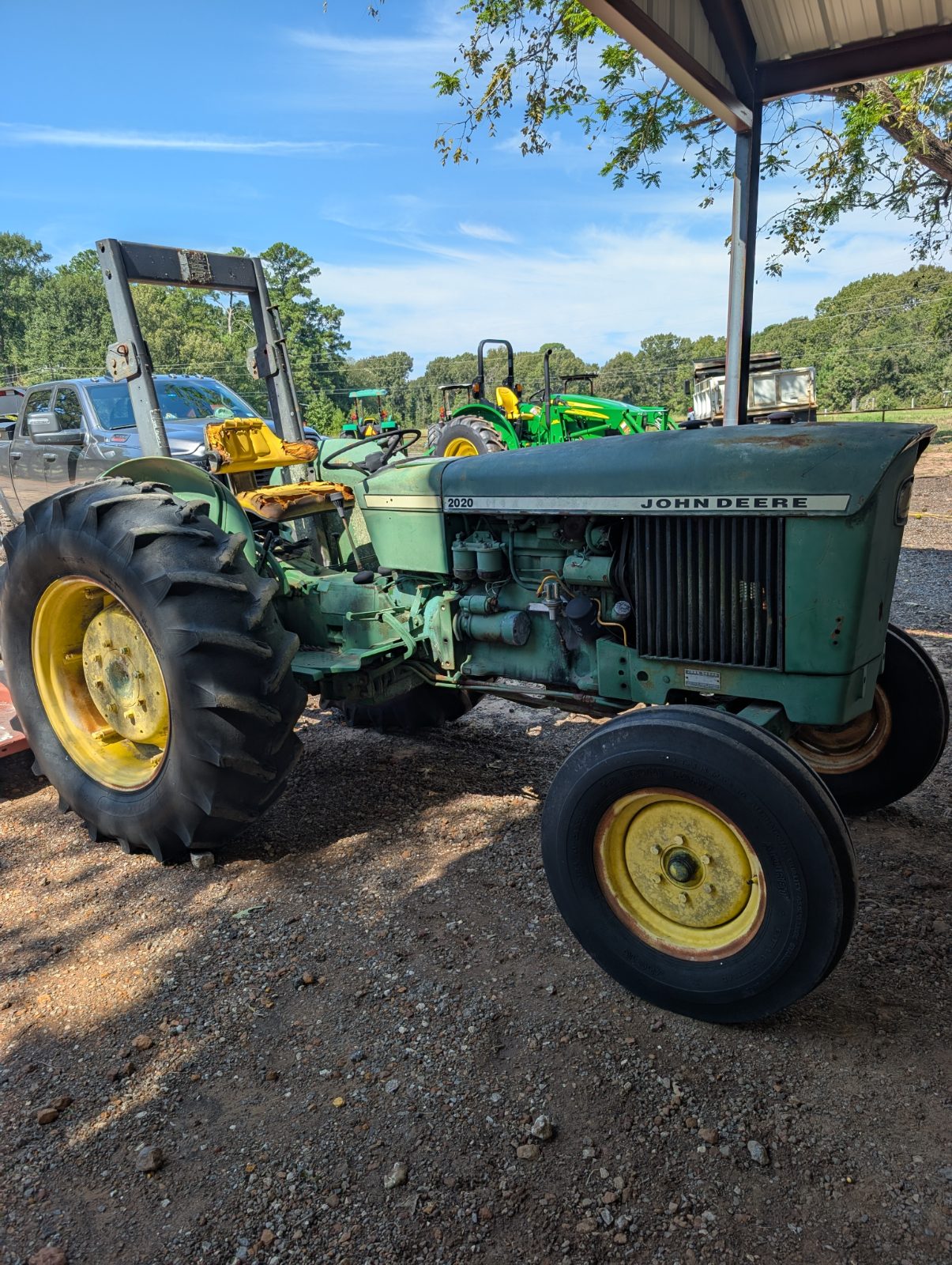 John Deere 2020 tractor with implements